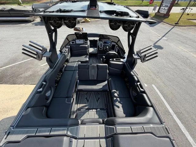 Slide: The Image of Interior of 2023 Supra SL550 boat with luxurious features. - 32