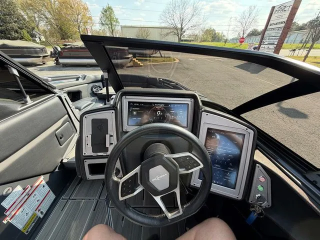 Slide: The Image of Interior of a 2023 Supra SL550 with modern dashboard and steering wheel. - 33