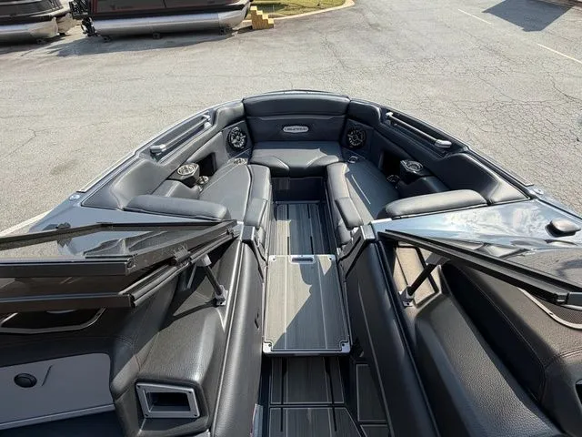 Slide: The Image of Interior of a 2023 Supra SL550 boat with luxurious seating. - 34