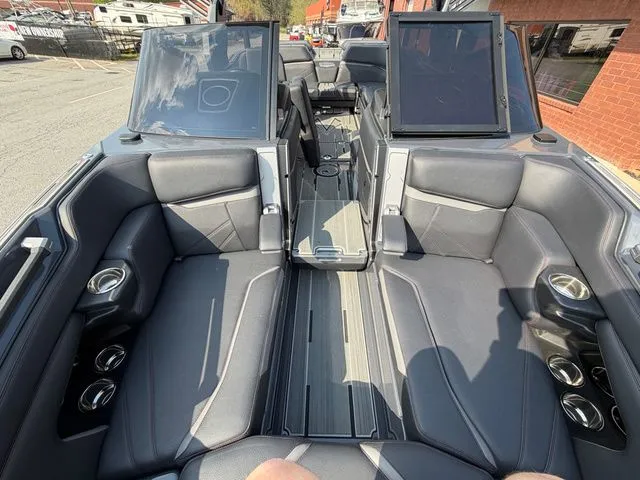 Slide: The Image of Interior of a 2023 Supra SL550 with luxurious leather seating. - 35