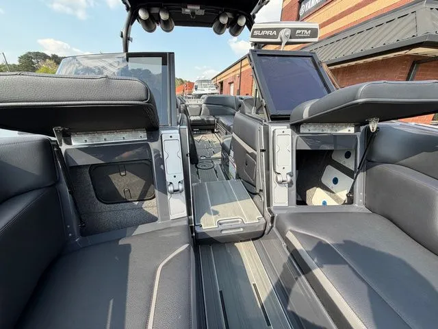 Slide: The Image of Interior of a 2023 Supra SL550 boat with modern seating. - 36