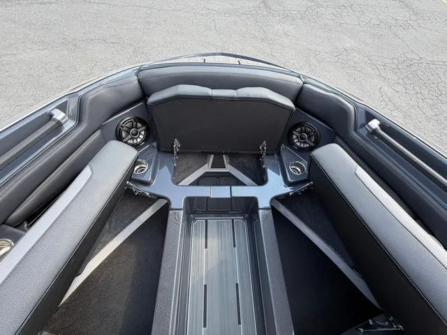 Slide: The Image of 2023 Supra SL550 boat interior with sleek seating and speakers. - 37