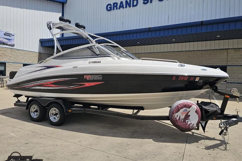 Slide: The Image of 2007 Yamaha Boats AR230 HO on trailer outside a building. - 11