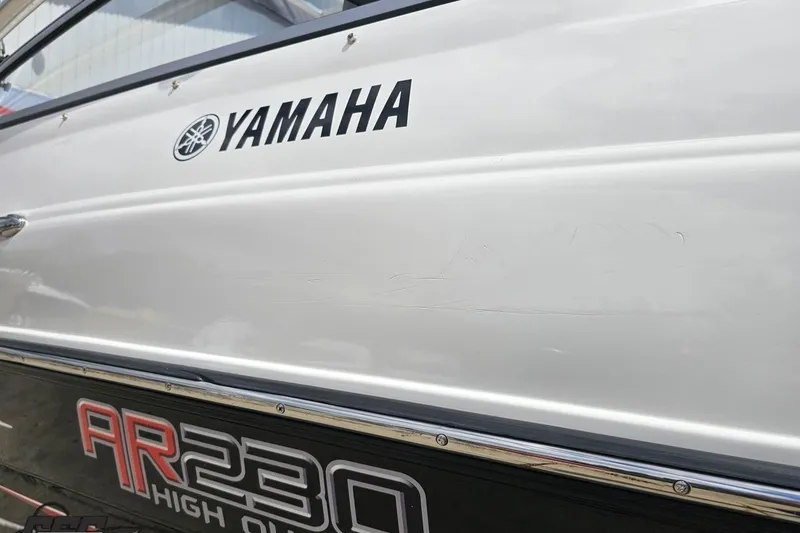 Slide: The Image of 2007 Yamaha Boats AR230 HO side view with logo and model name. - 34