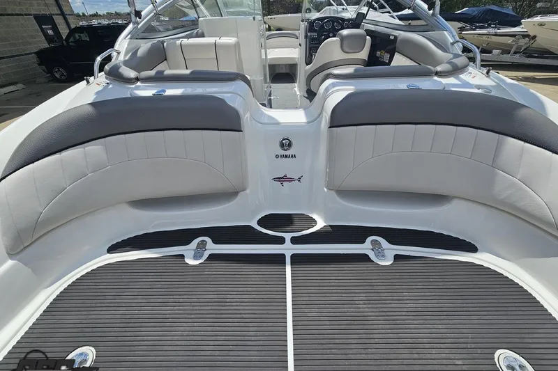 Slide: The Image of 2007 Yamaha Boats AR230 HO interior with sleek seating and modern dashboard. - 38