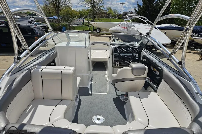 Slide: The Image of 2007 Yamaha Boats AR230 HO interior with sleek seating and modern dashboard design. - 41