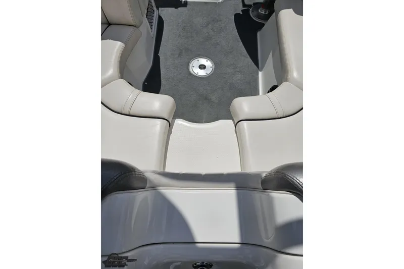 Slide: The Image of 2007 Yamaha Boats AR230 HO interior seating with gray carpet and white upholstery. - 43