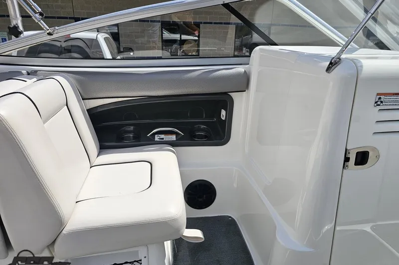 Slide: The Image of Interior seating of 2007 Yamaha Boats AR230 HO with cup holders and sleek design. - 50
