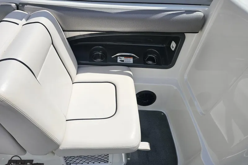 Slide: The Image of 2007 Yamaha Boats AR230 HO interior seating with white upholstery and black accents. - 51