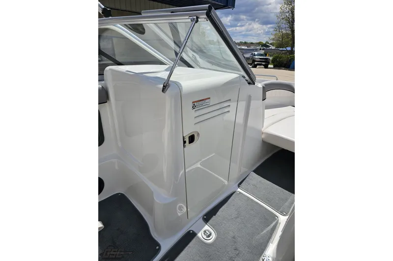 Slide: The Image of 2007 Yamaha Boats AR230 HO interior with white seating and sleek design. - 52