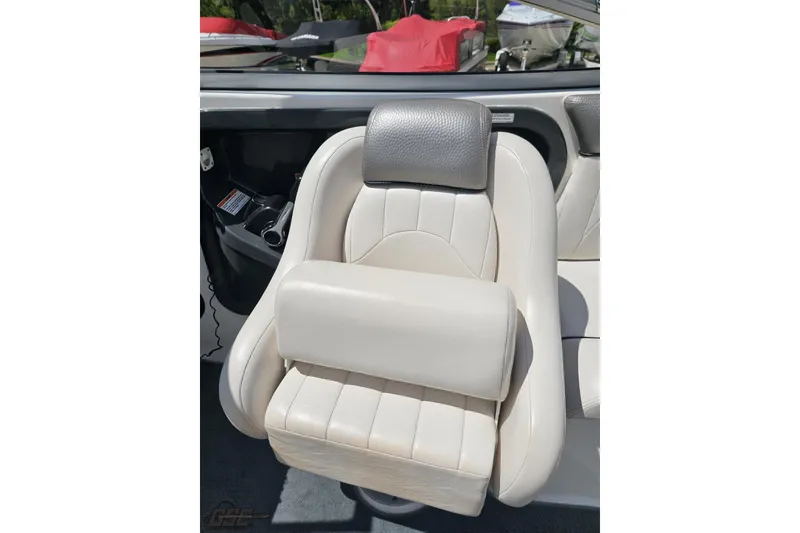 Slide: The Image of 2007 Yamaha Boats AR230 HO interior seat, featuring white leather upholstery and ergonomic design. - 56