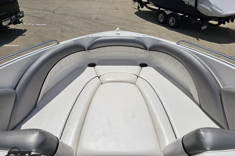 Slide: The Image of 2007 Yamaha Boats AR230 HO bow seating area with gray and white upholstery. - 64