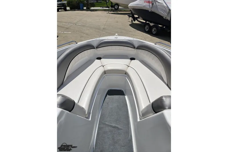 Slide: The Image of 2007 Yamaha Boats AR230 HO bow seating area with white and gray upholstery. - 66
