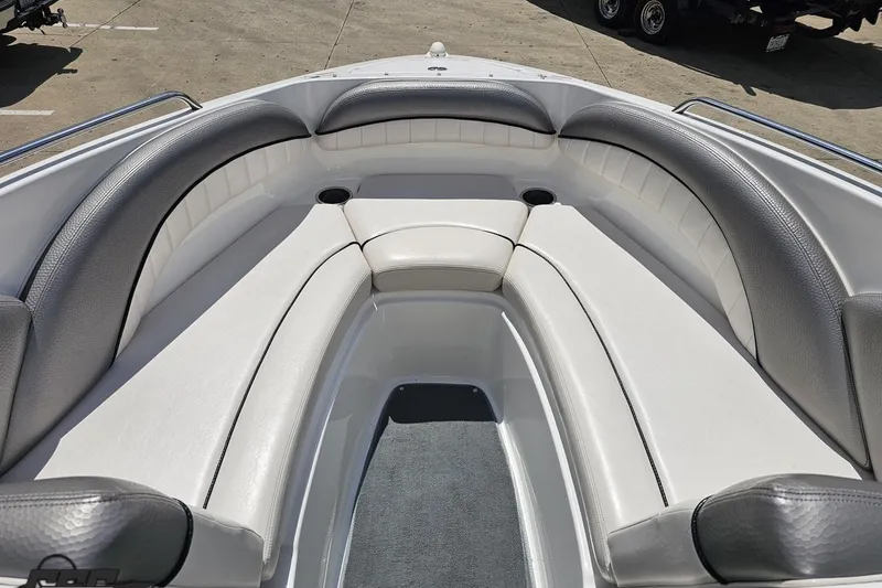 Slide: The Image of 2007 Yamaha Boats AR230 HO interior with cushioned seating and cup holders. - 67