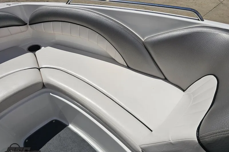 Slide: The Image of 2007 Yamaha Boats AR230 HO interior seating with white and gray upholstery. - 69