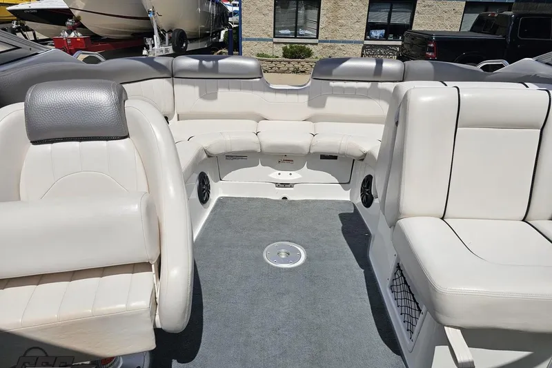 Slide: The Image of 2007 Yamaha Boats AR230 HO interior with white seating and gray carpet. - 73