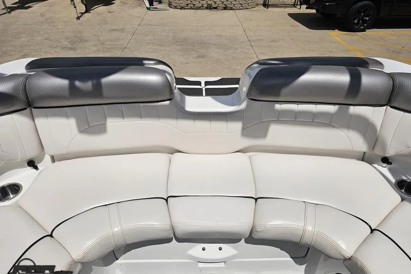 Slide: The Image of 2007 Yamaha Boats AR230 HO interior seating with white and gray upholstery. - 77