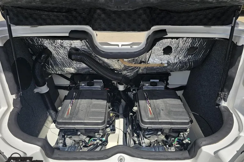 Slide: The Image of Engine compartment of a 2007 Yamaha Boats AR230 HO, showcasing dual engines and insulation. - 83