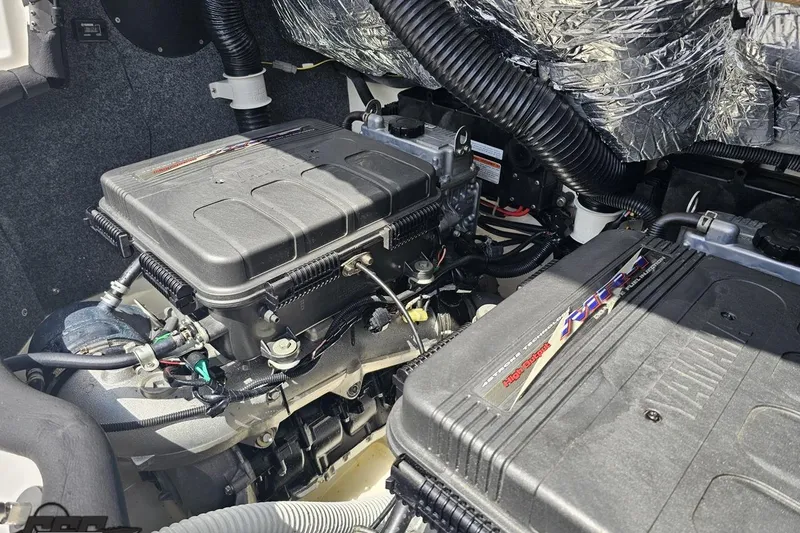 Slide: The Image of Engine compartment of a 2007 Yamaha Boats AR230 HO, showcasing dual engines and components. - 85
