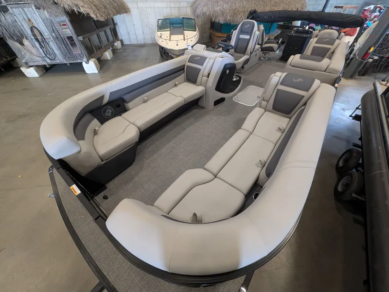Slide: The Image of Interior of 2025 Barletta Cabrio 24CC with luxurious seating. - 10