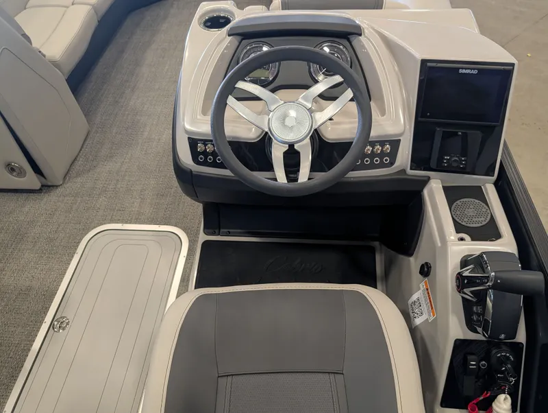Slide: The Image of Interior of 2025 Barletta Cabrio 24CC with steering console. - 14