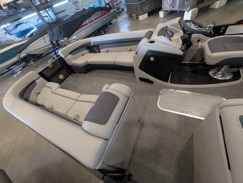 Slide: The Image of Interior of 2025 Barletta Cabrio 24CC with luxurious seating. - 17