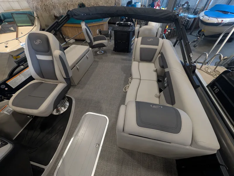 Slide: The Image of Interior of 2025 Barletta Cabrio 24CC with gray seating. - 19