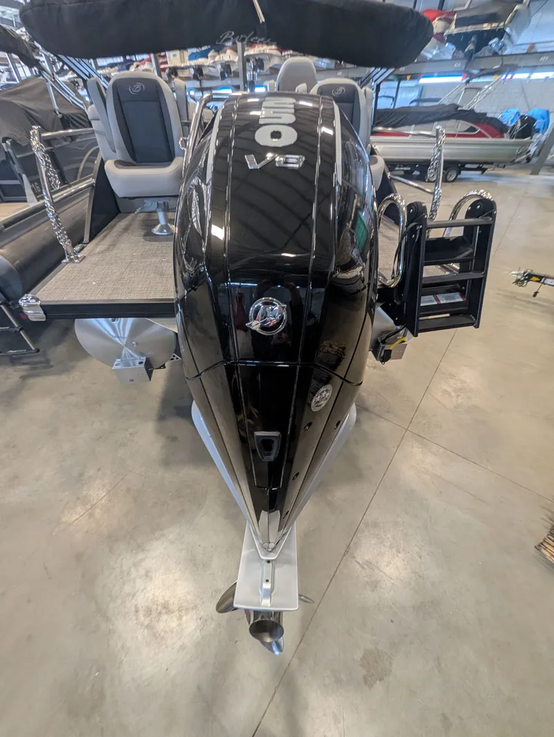 Slide: The Image of 2025 Barletta Cabrio 24CC with powerful outboard motor. - 26