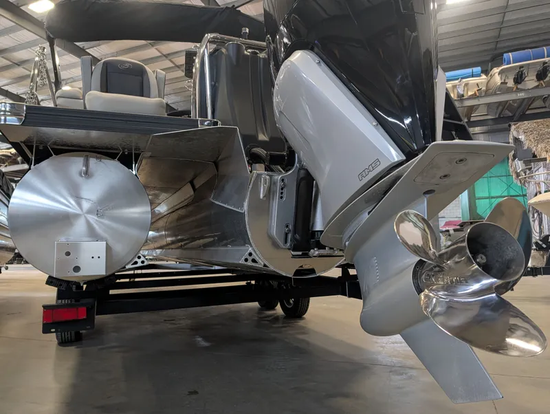 Slide: The Image of Rear view of 2025 Barletta Cabrio 24CC with motor and propeller. - 27