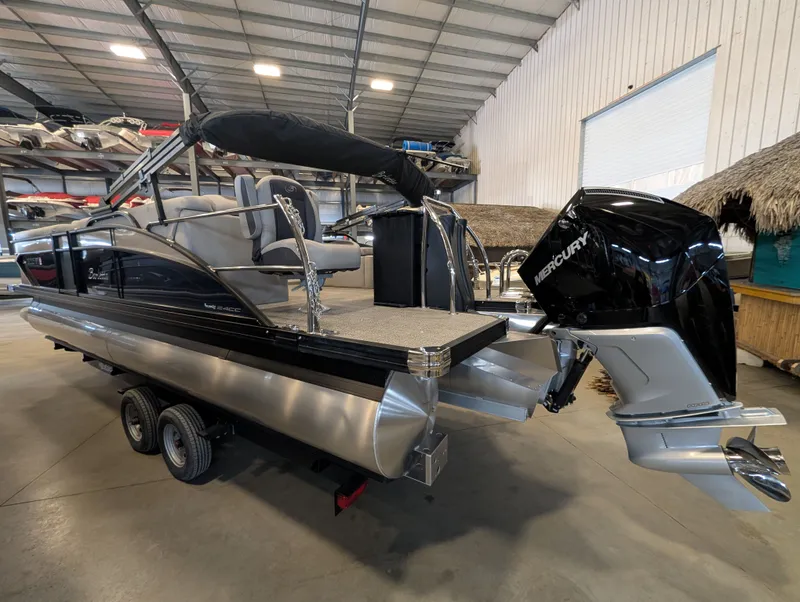 Slide: The Image of 2025 Barletta Cabrio 24CC pontoon boat in warehouse. - 4
