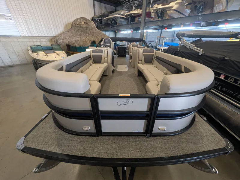Slide: The Image of 2025 Barletta Cabrio 24CC pontoon boat in showroom. - 7