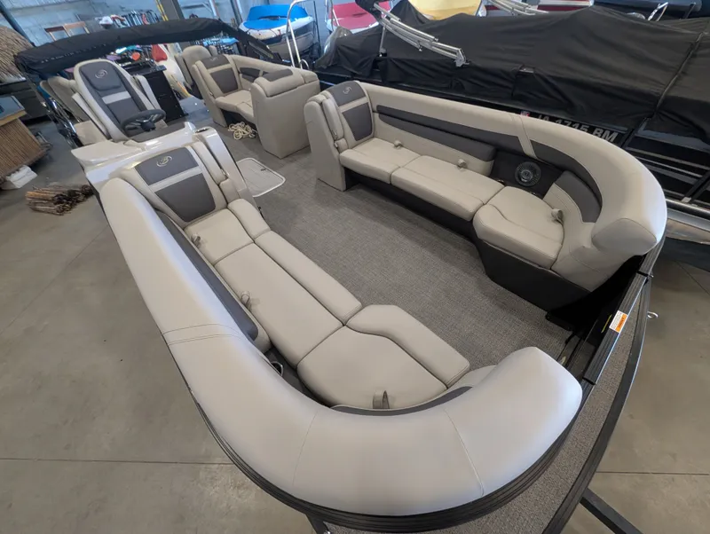 Slide: The Image of Interior of 2025 Barletta Cabrio 24CC with luxurious seating. - 8