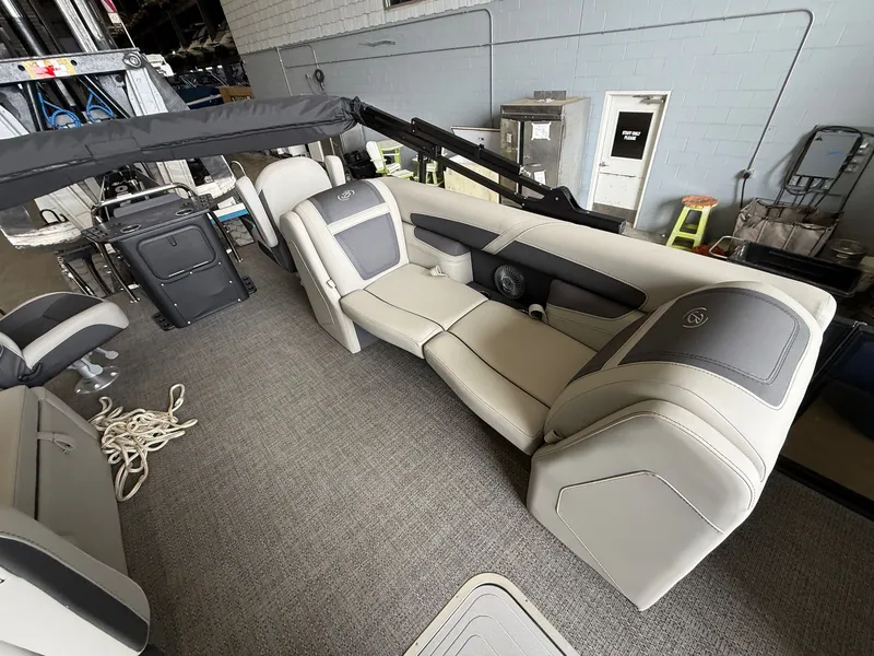 Slide: The Image of Interior of 2025 Barletta Cabrio 24CC with gray leather seating. - 9