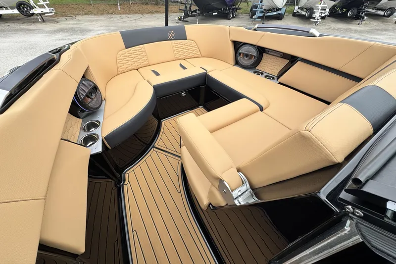 Slide: The Image of Luxurious interior of 2025 MasterCraft X26 boat with tan seating and sleek design. - 14