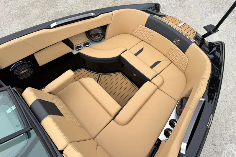 Slide: The Image of Luxurious interior of 2025 MasterCraft X26 boat with tan leather seating and sleek design. - 15