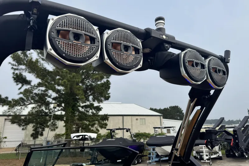 Slide: The Image of 2025 MasterCraft X26 boat with premium audio speakers on a wakeboard tower. - 24