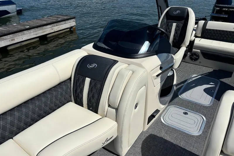 Slide: The Image of Luxurious 2025 Barletta L25UCAT boat interior with plush seating and sleek design. - 11