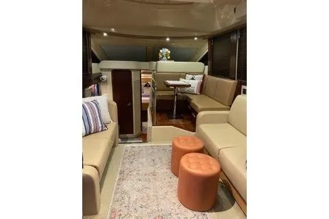 Slide: The Image of 2007 Sea Ray 36 Sedan Bridge shower with oval window and modern fixtures. - 11