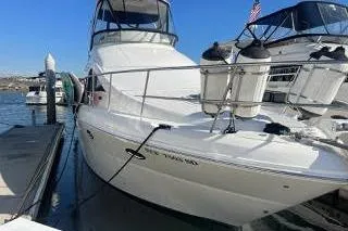 Slide: The Image of 2007 Sea Ray 36 Sedan Bridge yacht docked at marina. - 2