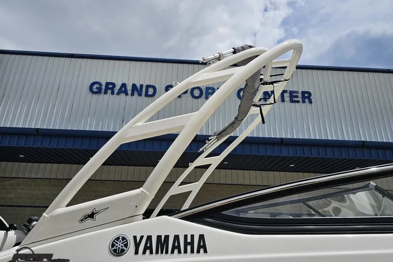 Slide: The Image of 2022 Yamaha AR195 boat at Grand Sport Center, showcasing sleek design and modern features. - 10