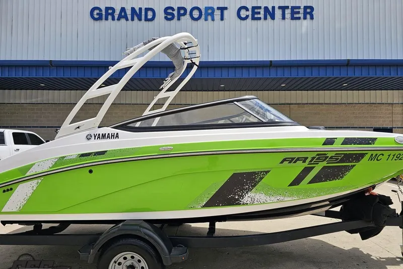Slide: The Image of 2022 Yamaha AR195 boat in vibrant green at Grand Sport Center. - 3