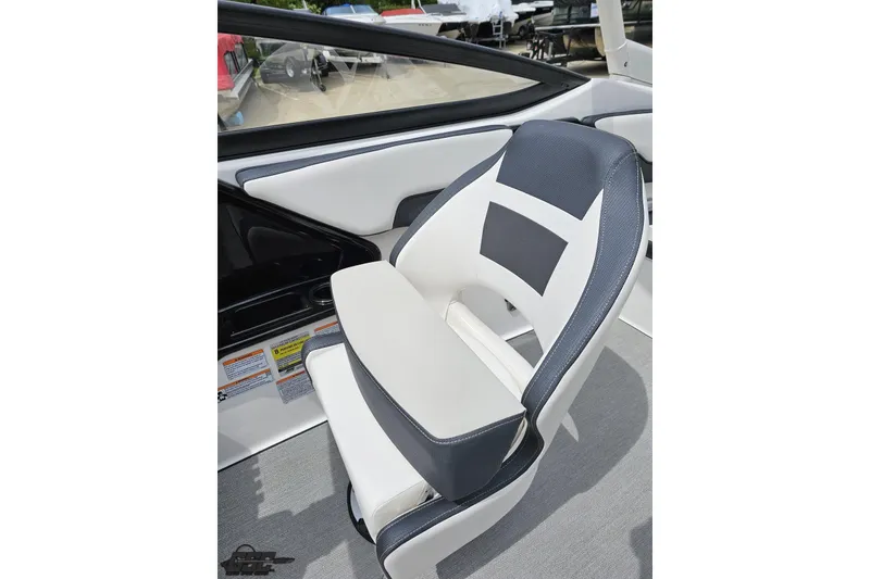 Slide: The Image of 2022 Yamaha Boats AR195 interior seat, featuring sleek white and gray design. - 54