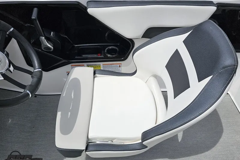 Slide: The Image of Captain's seat and steering wheel of 2022 Yamaha Boats AR195, featuring sleek design and controls. - 55
