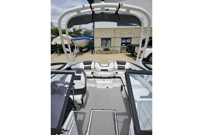 Slide: The Image of 2022 Yamaha Boats AR195 interior view, showcasing seating and sleek design. - 77