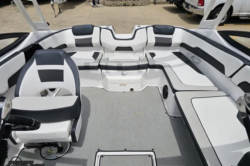 Slide: The Image of 2022 Yamaha Boats AR195 interior with sleek seating and modern design. - 79