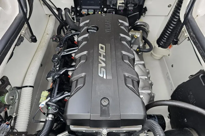 Slide: The Image of 2022 Yamaha Boats AR195 engine compartment showcasing SVHO engine details. - 95