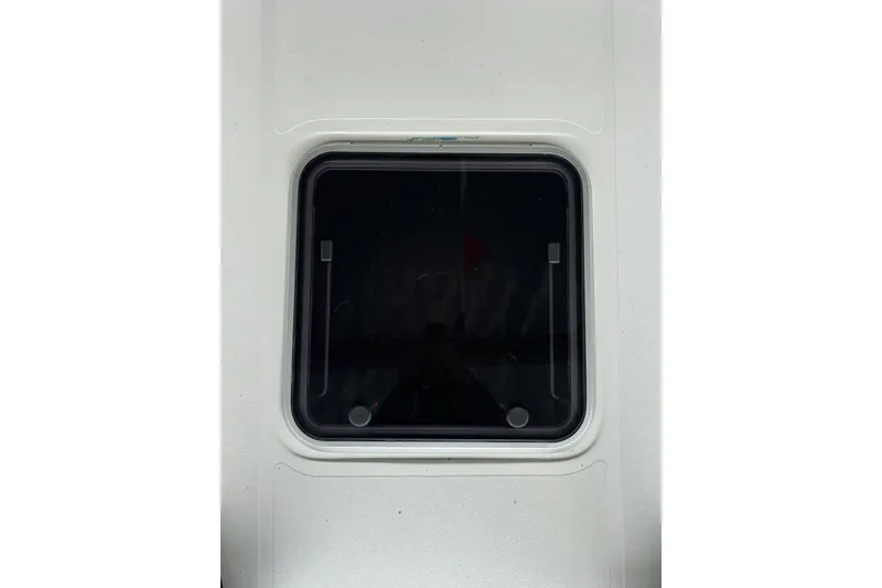 Slide: The Image of Square window on a 1992 Tiara Sport 270 Sport boat. - 9