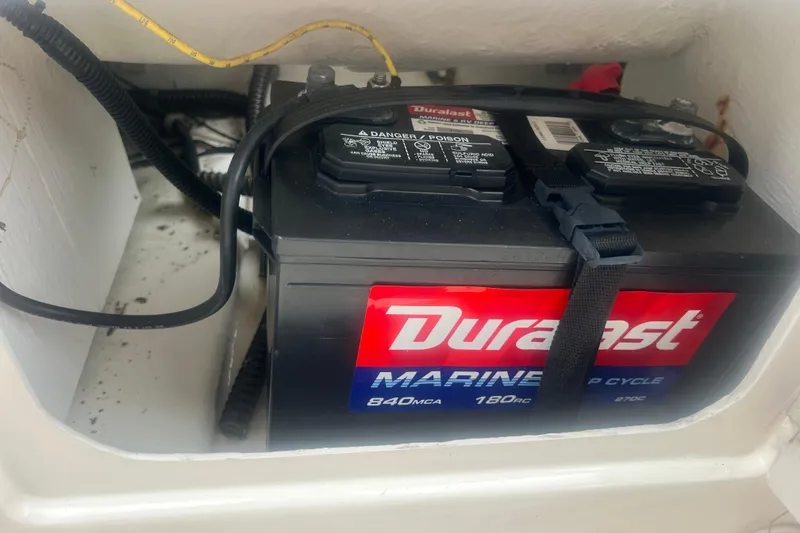 Slide: The Image of Duralast marine battery in 2015 Bayliner Element XL boat compartment. - 23