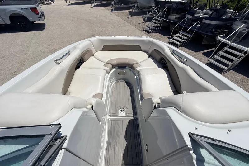 Slide: The Image of 2018 Crownline Eclipse E26 XS boat with spacious seating and sleek design. - 14