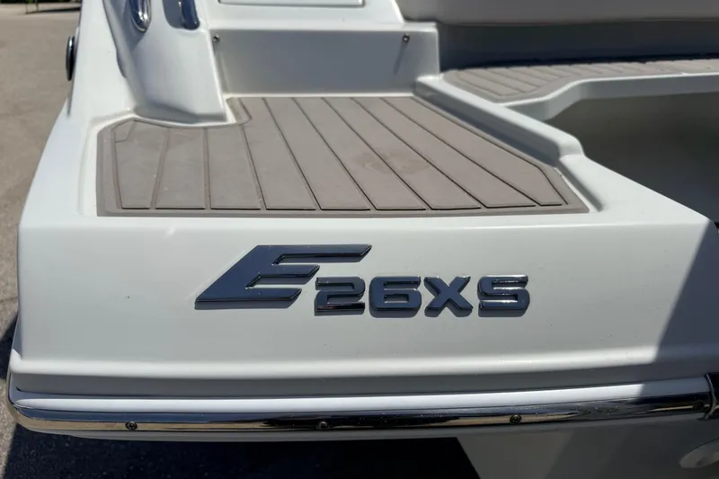 Slide: The Image of 2018 Crownline Eclipse E26 XS boat rear deck with model emblem. - 27